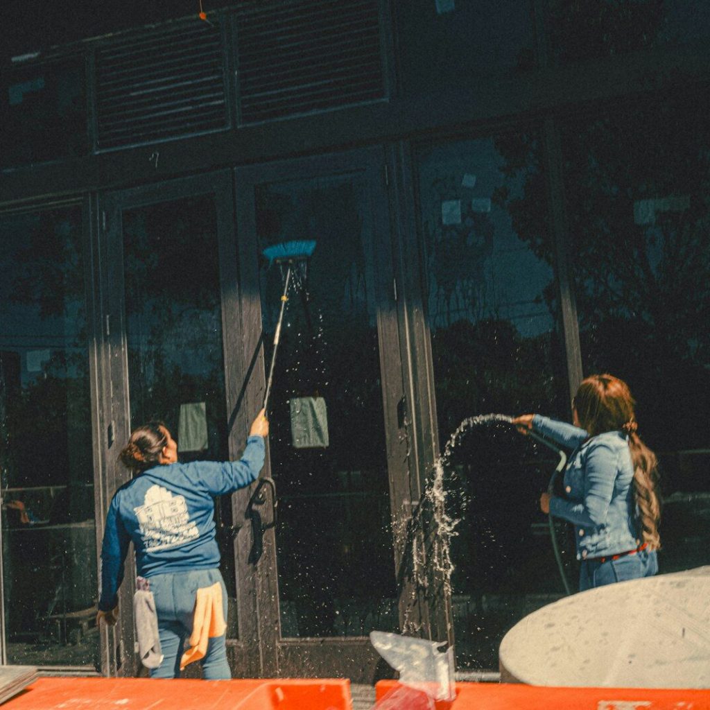 a group of people standing outside of a building